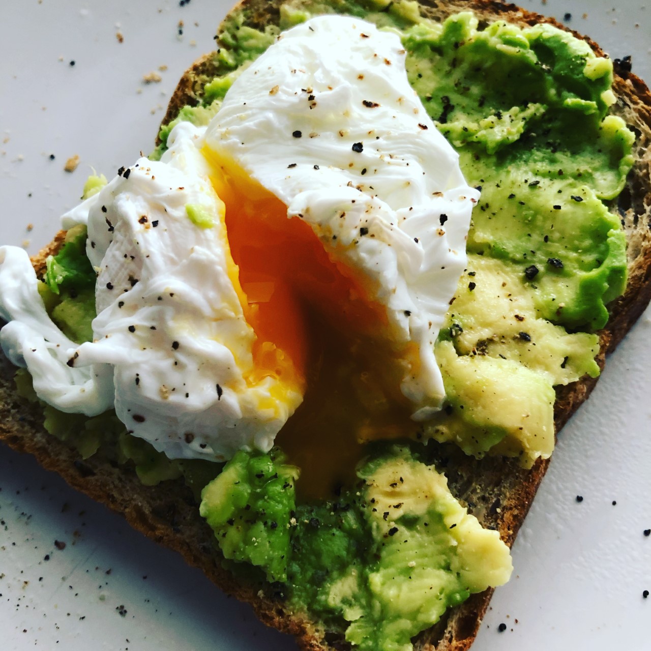 Crushed avocado and poached egg on toast